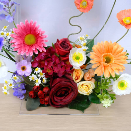ดอกไม้ประดิษฐ์ผ้าในแจกัน  JGLORYFLOWER  แจกันพลาสติกใส รูปทรงกระเป๋า ดอกไม้คละชนิด สีแดง/ส้ม_3