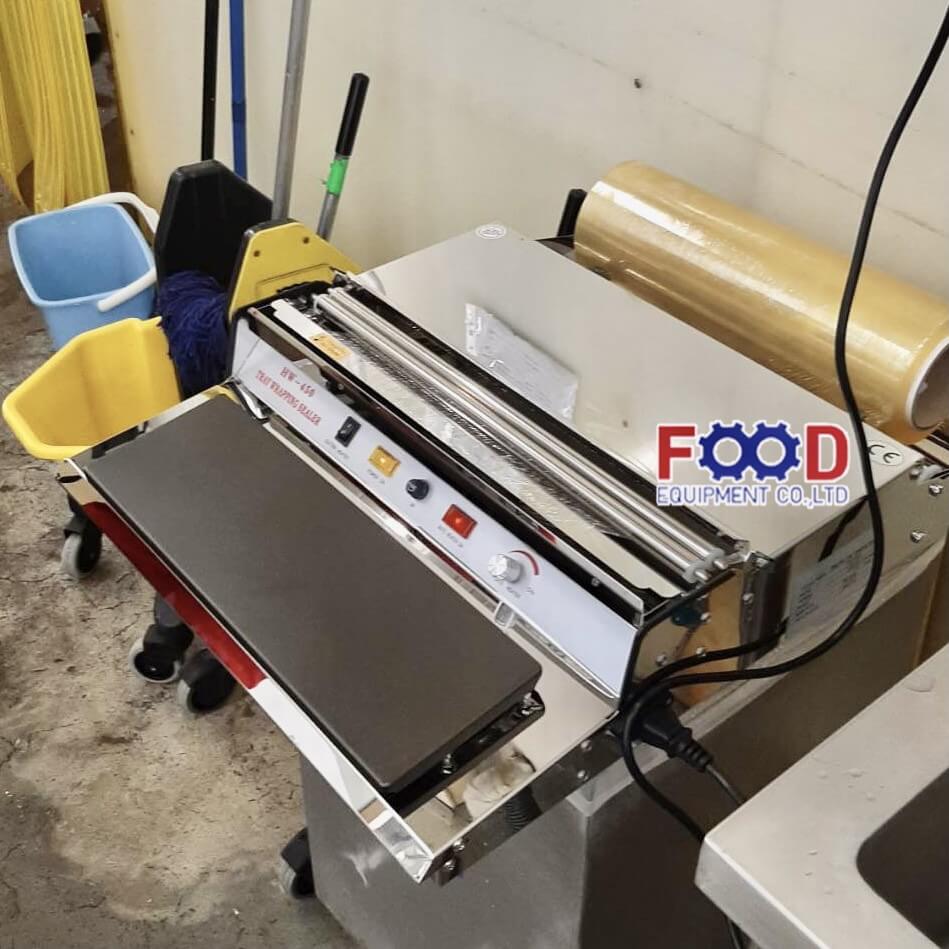 เครื่องห่อฟิล์มอาหาร FOOD EQUIPMEN รุ่น HW-450 สำหรับถาดอาหาร